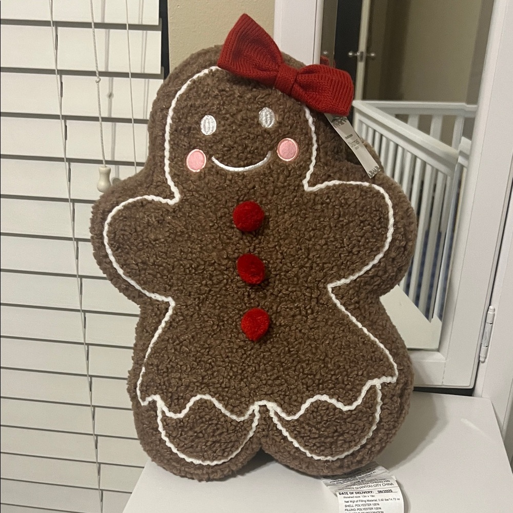 Brown Gingerbread Man Plush with Red Accents pillow